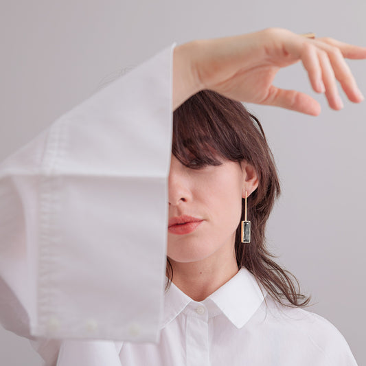 BRINCO COMPRIDO C/ BAGUETE P C/OURO